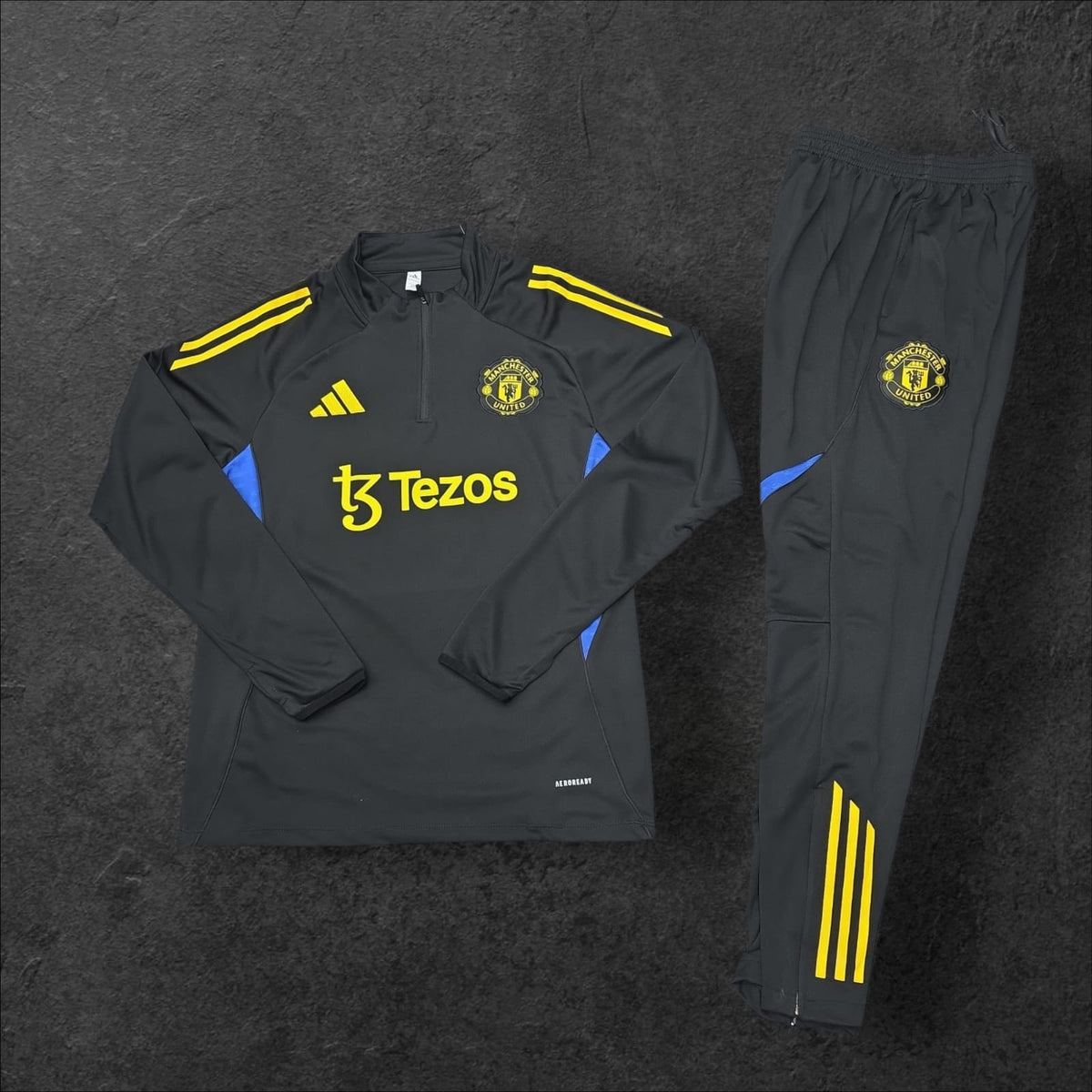 Manchester United Training Tracksuit – Black/Yellow/Blue, Adidas, Tezos sponsor